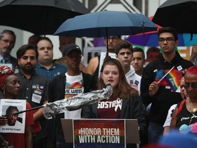 Aly Sheehy, a Marjory Stoneman Douglas High School shooting survivor, speaks during a rally in front of Orlando city hall on Monday in Orlando, Florida. Pulse nightclub and Marjory Stoneman Douglas High School shooting survivors and their supporters held the rally to demand political leaders stop the epidemic of gun violence as well as reject NRA influence and help the communities around the country that have experienced mass shootings. (Joe Raedle/Getty Images)