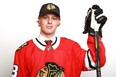 Adam Boqvist poses after being selected eighth overall by the Chicago Blackhawks during the first round of the 2018 NHL Draft. (Photo by Tom Pennington/Getty Images)