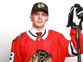 Adam Boqvist poses after being selected eighth overall by the Chicago Blackhawks during the first round of the 2018 NHL Draft. (Photo by Tom Pennington/Getty Images)