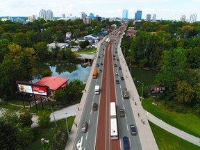 An artist's rendering shows bus rapid transit going north on the Wellington Road bridge toward downtown London.