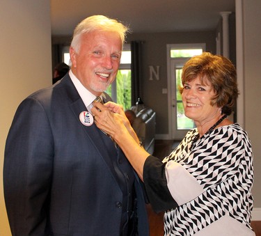 Progressive Conservative Rick Nicholls gets his tie straightened by his wife Dianne, shortly before leaving to meet supporters in Chatham Thursday. Nicholls was re-elected to the renamed Chatham-Kent-Leamington riding for a third term. Ellwood Shreve/Chatham Daily News)