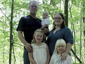 Community members identified the victims of the early Monday morning house fire in this family photo taken last fall as John Kramer Jr., and daughters Shailyn, 9, and Britnee, 5. Dillon, 15 months, survived, as did his mother, Lindsy Mitchell, who was in a London hospital Wednesday. (Monica Graham Photography)