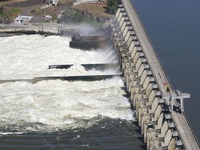 In this June 3, 2011 file photo, the Dalles Dam on the the Columbia River, is shown in The Dalles, Ore. Talks are scheduled to begin Tuesday, May 29, 2018, in Washington, D.C., to modernize the document that coordinates flood control and hydropower generation in the U.S. and Canada along the Columbia River.