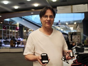 Roderick Lawson, 66, went to the London Public Library Central branch on Friday to pick up a wifi hotspot. He said he's happy to not have to pay internet bills. (SHALU MEHTA/THE LONDON FREE PRESS)