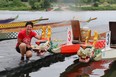 Linda Kuska, Rowbust captain and festival co-chair, shows off two dragon boats used during the Fanshawe Dragon Boat Festival. The festival raises money for the ACT Now fund, which helps cancer patients pay for medications not covered by health insurance. (Shannon Coulter / The London Free Press)