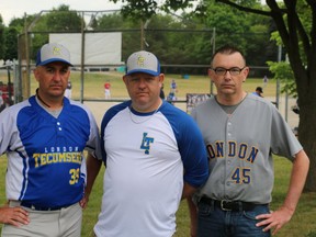 Tecumseh club president Wayne Bilger (left), board member and coach Andrew Angus and Ward 2 councillor candidate Shawn Lewis at CNRA Park for Opening Day on Sunday. The team ran a fundraiser during opening day to raise money for equipment they lost during their storage shed break-ins. (Shannon Coulter / The London Free Press)