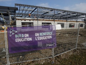 Construction proceeds on a new elementary school on Cedarhollow Boulevard, east of Highbury Ave. (File photo)