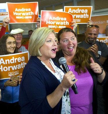 Chatham NDP candidate Jordan McGrail flashes a thumbs up as she stands next to NDP leader Andrea Horwath at the McGrail election office in Chatham during a campaign stop on Monday.  Mike Hensen/The London Free Press/Postmedia Network