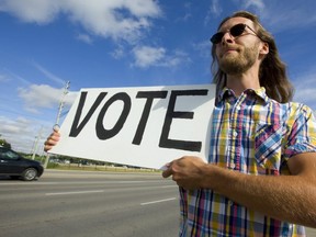 Just like in most every election the last decade, London’s one-man turnout machine will be at it again Thursday, trudging what 
he figures will be about 35,000 steps on city streets to get you out to vote. King’s College sociology student Eric Shepperd, who describes himself as ‘an advocate for democratic participation’ says he carries the sign because it’s ‘something substantial I can do.’ 
What are you waiting for? (MIKE HENSEN, The London Free Press)