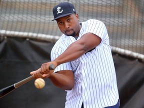 Cleveland Brownlee, the DH of the London Majors hits a little batting practice in Labatt Park in London, Ont.  (MIKE HENSEN, The London Free Press)