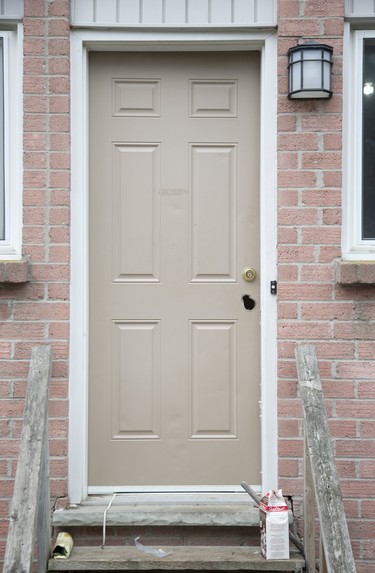 A man was shot in the hand/wrist with a shotgun after an intruder gained entry by shooting the door handle off the back door of unit 47 at 1443 Huron St. in London. (Derek Ruttan/The London Free Press)