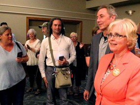 Peggy Sattler won London West for the NDP Thursday night in a mini-Orange Crush in the Forest City. She is accompanied by her husband Neil Bradford.

Mike Hensen/The London Free Press/Postmedia Network