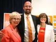 Winning NDP candidates Peggy Sattler, Terence Kernaghan and Teresa Armstrong savour the Orange Crush in London. Mike Hensen/The London Free Press/Postmedia Network