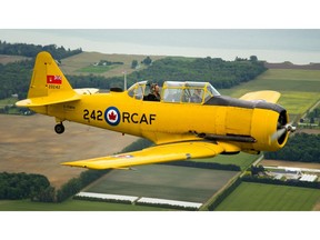 Allan Paige flys Harvard C-FWPK, a Second World War era pilot trainer that entered service on Feb. 29th, 1952, making it a leap year plane, and therefore one of the youngest flying in terms of birthdays. The Harvards that entered service after the war were used as a first trainer for pilots before they moved onto more sophisticated trainers and then jets. The Harvards were flying along the Lake Erie shoreline south of St. Thomas as part of a promotion for the upcoming Great Lakes International Airshow that runs June 16-17 at the St. Thomas airport. (Mike Hensen/The London Free Press)