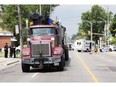A cyclist was killed after colliding with flat bed transport truck on Adelaide Street just north of Dundas Road in London.. (Derek Ruttan/The London Free Press)