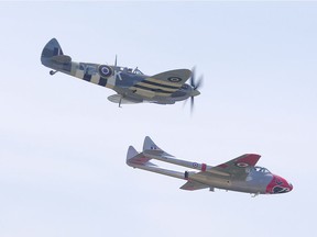 A Spitfire IX TE-294, left, and a de Havilland Vampire fly together during the 2018 Great Lakes International Airshow in St. Thomas. (Derek Ruttan/The London Free Press)