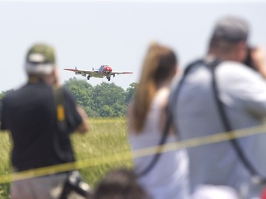 Spectators watch a de Havilland Vampire fighter jet Sunday during the 2018 Great Lakes International Airshow in St. Thomas. Derek Ruttan/The London Free Press