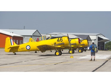 Three Harvards line up on the tarmac during the 2018 Great Lakes International Airshow  in St. Thomas during the weekend. Airshow visitors also got to see the iconic Second World War era training aircraft in flight. Derek Ruttan/The London Free Press