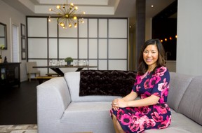 Ngan Nguyen on the main floor living area of her home at 152 Elmwood Ave in Old South. The building was originally designed as a condo, now it's used as a single family dwelling on the main floor with the upper floor used for AirBnB and events in London. (Mike Hensen/The London Free Press)