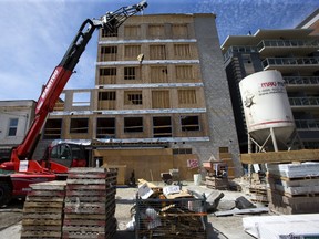 Fifty of the sixty-nine units at this apartment building under construction on Dundas St. will be affordable housing in London. (Derek Ruttan/The London Free Press)