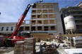 Fifty of the sixty-nine units at this apartment building under construction on Dundas St. will be affordable housing in London. (Derek Ruttan/The London Free Press)