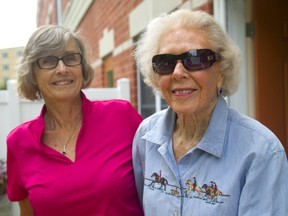 Dinnie Greenway right, with her daughter Dee Lewis at her home in London. (Mike Hensen/The London Free Press)