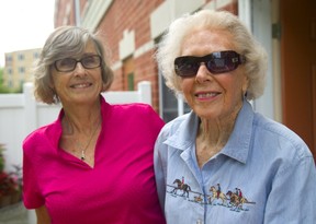 Dinnie Greenway right, with her daughter Dee Lewis at her home in London. (Mike Hensen/The London Free Press)