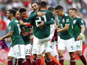 Mexico players celebrate after winning their match against Germany at the 2018 Men's World Cup in the Luzhniki Stadium in Moscow, Russia, Sunday, June 17, 2018.