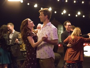 This image released by Netflix shows Zoey Deutch, left, and Glen Powell in a scene from "Set It Up," premiering June 15 on Netflix.
