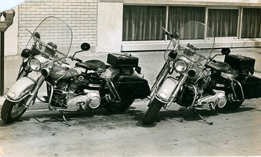 Two London police motorcycles parked on Talbot Street, 1972. (London Free Press files)