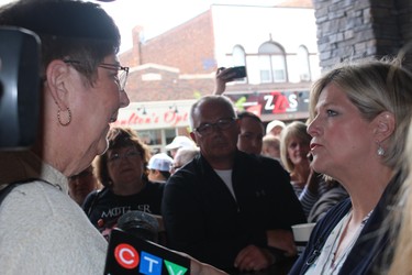 Joanne Rowe tells NDP leader Andrea Horwath about the funding challenges faced by group homes for people with special needs. Horwath made a short stop in Sarnia Monday morning. NEIL BOWEN/Sarnia Observer