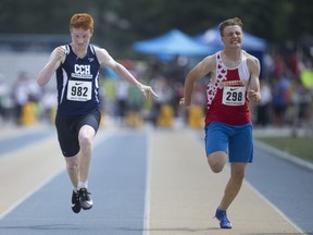 Matt Pimentel, left, from Catholic Central High School in London, and Lucas Baranoski, from Resurrection Catholic Secondary School compete in the midget men's 100-meter dash at the OFSAA West Regionals Track and Field Meet at Alumni Field, Friday, June 1, 2018.  (DAX MELMER/Windsor Star)