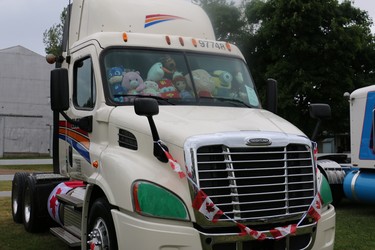 One of the trucks on display at Trucking for Kids, with the dashboard full of stuffed animals in honour of the truck show for youngsters in Ilderton. (SHANNON COULTER, The London Free Press)