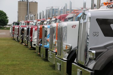 A line of trucks on display at the Ilderton fairgrounds during Trucking for Kids on the weekend. (SHANNON COULTER, The London Free Press)