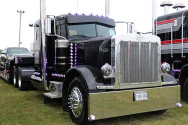 A truck on display shows off its purple lights at Trucking for Kids. (SHANNON COULTER, The London Free Press)