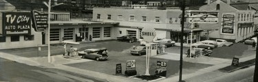 TV City Auto Plaza at Talbot and York intersection replaces old buildings. New plaza combines modern Shell station, talbot Auto Specialties's auto supply centre, restaurant and adjoining Television City store, 1959. (London Free Press files)