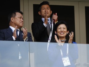Japan's Princess Takamado, right, applauds prior to the group H match between Colombia and Japan at the 2018 soccer World Cup in the Mordavia Arena in Saransk, Russia, Tuesday, June 19, 2018.