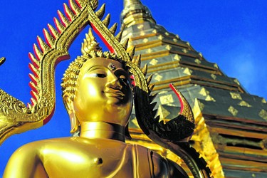 A golden Buddha statue glistens in the sun at the Wat Phra That Doi Suthep Buddhist temple outside of Chiang Mai.
(Jennifer Bieman/The London Free Press)