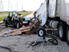 The aftermath of the crash on Highway 401 near Chatham that killed Lacie Brundritt, 42, and her son Kyle, 14, of Amherstburg, on July 30, 2017. The transport truck rear-ended the Brundritt family’s vehicle. (OPP photo)