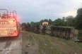 A tractor trailer overturned on Highway 402 Friday, causing police to block traffic in both directions. (Photo courtesy Sarnia Fire Rescue Services)