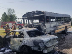 A man was killed Friday in Norfolk County after this fiery crash involving a bus and car. (Photo: Norfolk OPP)