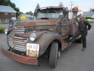 This 1941 GMC tow truck is vintage to the point of rustic. On patrol in downtown Port Dover Thursday on the eve of the big Friday the 13th motorcycle rally was proud owner Todd Filek of Jarvis. (MONTE SONNENBERG \ SIMCOE REFORMER)