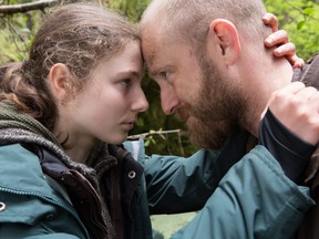 This image released by Bleecker Street shows Thomasin Harcourt McKenzie, left, and Ben Foster in a scene from "Leave No Trace."