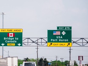 US - Canada border highway direction sign (Getty Images)