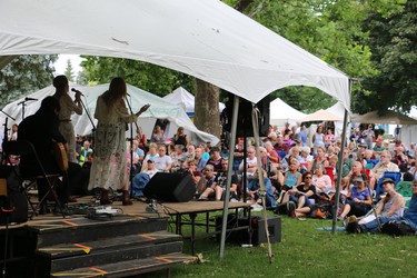 A large crowd listens to The Cedar Sisters perform Saturday on the east workshop stage during the Home County Music and Art Festival. (SHANNON COULTER, The London Free Press)