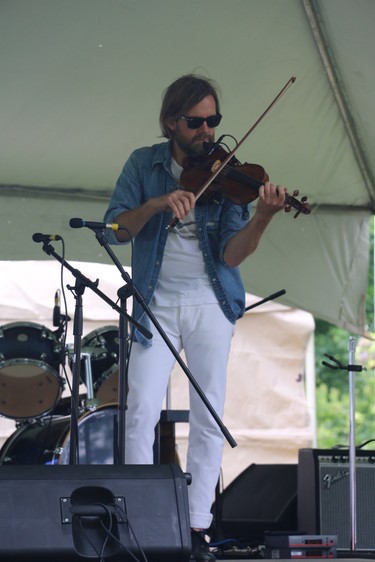 Dan Stacey of Dan Stacey and the Black Swans performs Saturday on the north concert stage during the Home County Music and Art Festival. (SHANNON COULTER, The London Free Press)