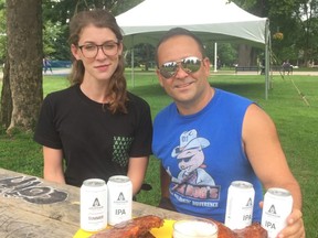 Lisa Wissink, event planner for London's Anderson Craft Ales, and Tom Diavolitsis, owner of Boss Hog's BBQ, are excited about the addition of 10 craft breweries to this year's London Ribfest, opening Thursday and continuing until Monday at Victoria Park. (Joe Belanger, The London Free Press)