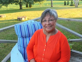 Newly-elected Oneida Nation of the Thames Chief Jessica Hill sits in front of her family home on the settlement. She says she is optimistic about the future and is ready to get things done. (SHALU MEHTA, The London Free Press)