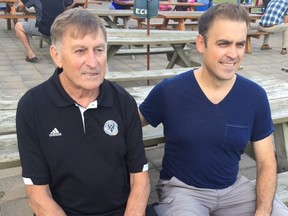 Jurgen Klaus and his son Alan, waiting for the soccer game to start at German Canadian Club. (MORRIS DALLA COSTA, The London Free Press)