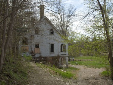 The historic Cedars home had fallen into disrepair in rectn years. Free Press file photo